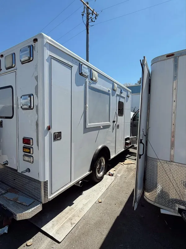 The ambulance’s side with the service window cut in and fitted